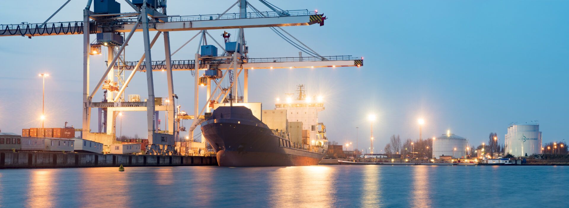 Containers loading by crane in the morning , Trade Port , Shipping