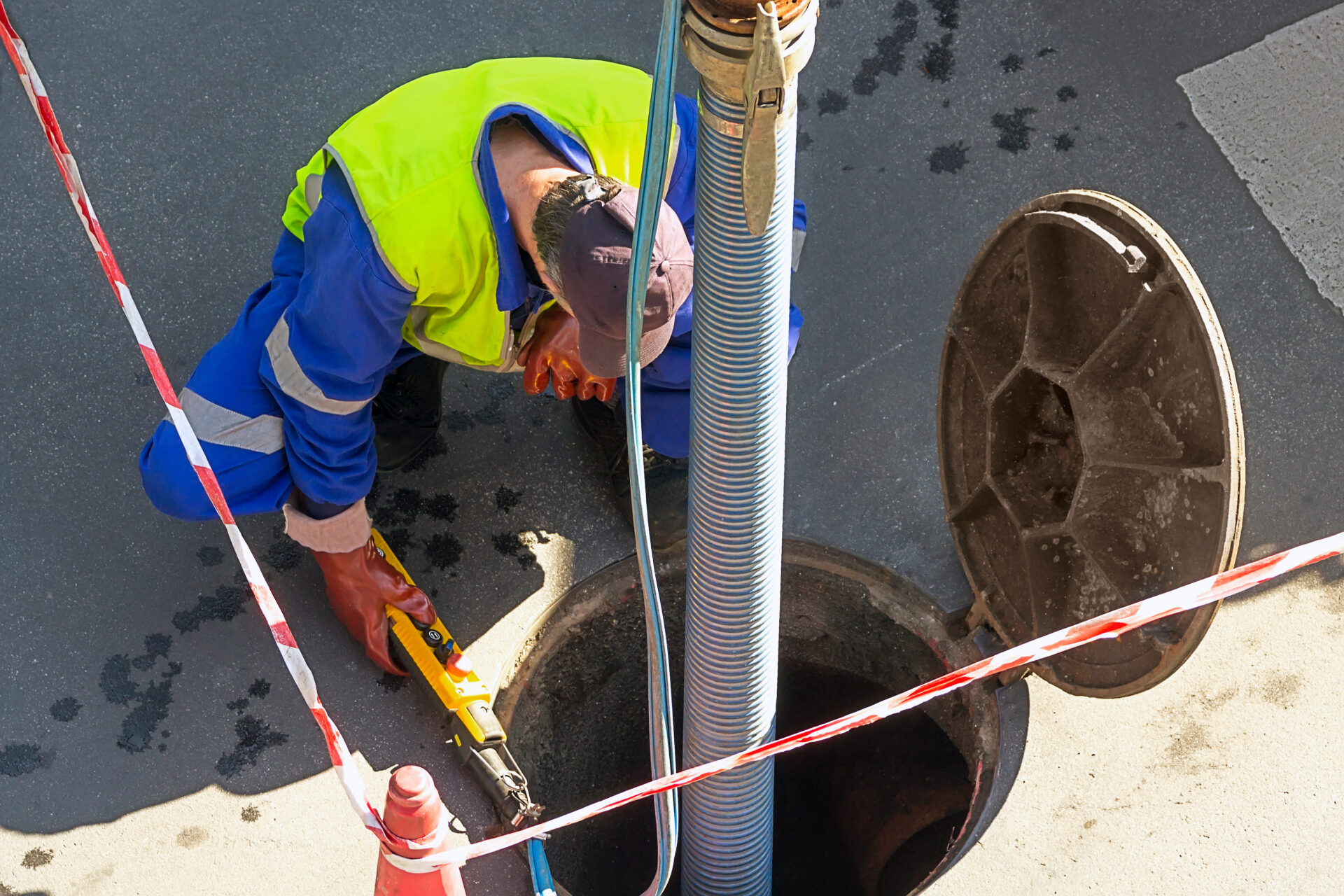 sewerage truck service and utility workers for cleaning sewer