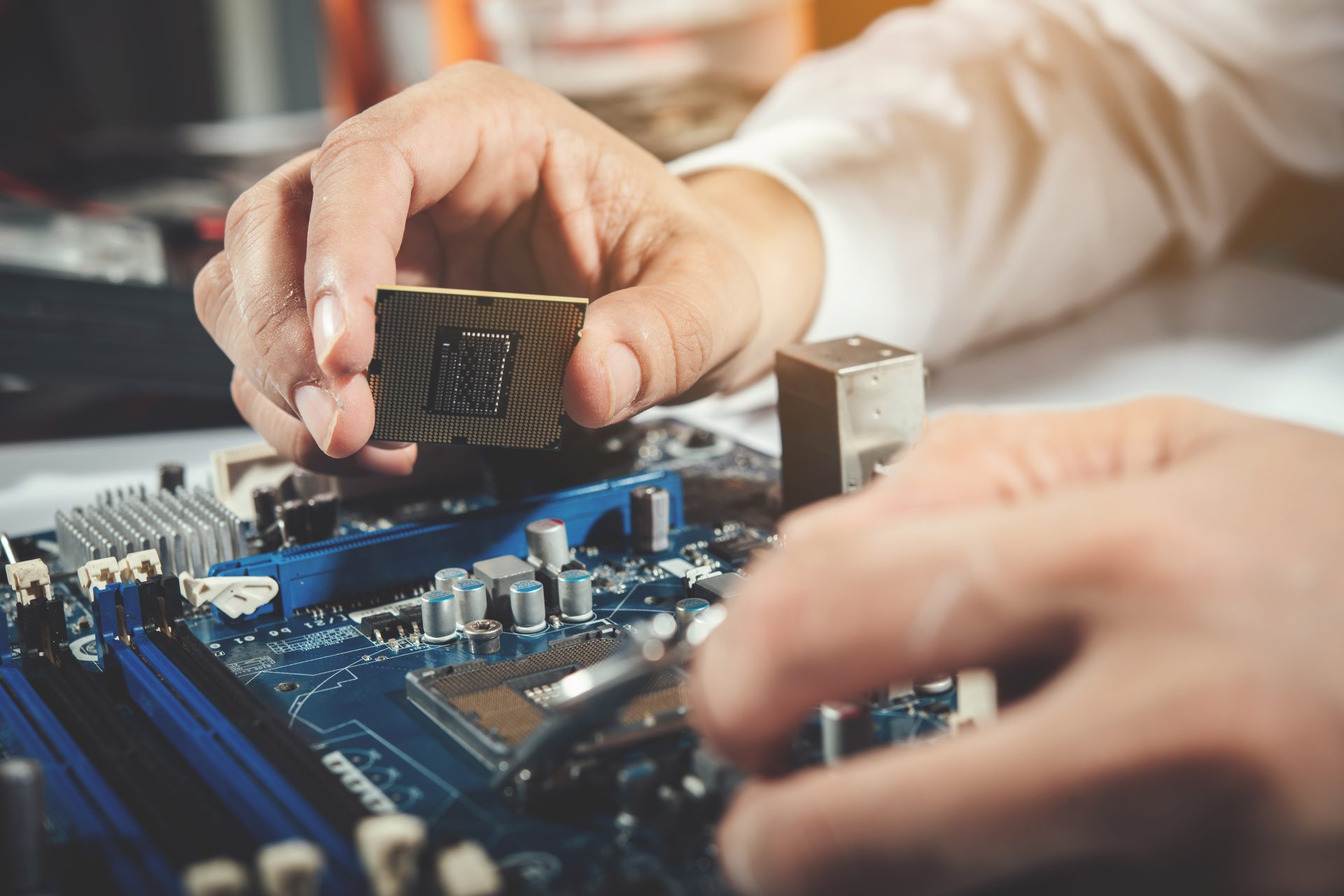 The technician repairing the computer,computer hardware, repairi